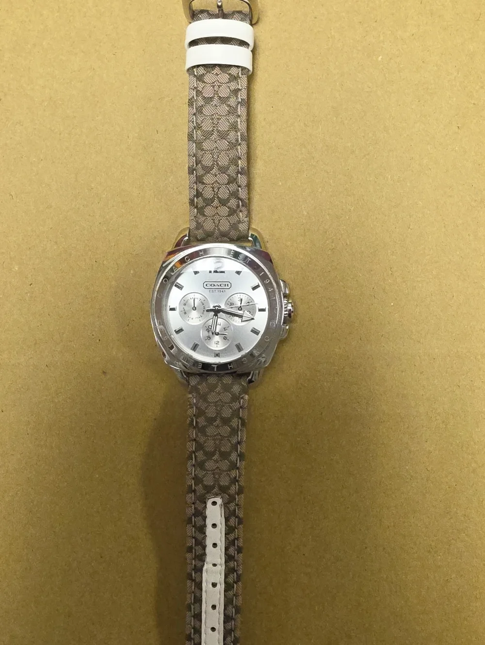 Coach Woman's Chronograph Watch with Silver Dial and Brown Signature Strap